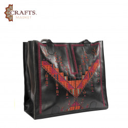 A hand-embroidered black leather bag