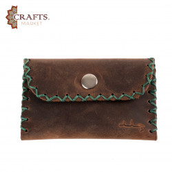 A handmade Brown leather snap wallet