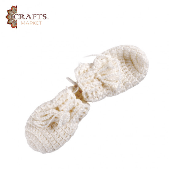 Handmade wool baby’s jacket with tassels and mittens