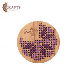 A hand-embroidered wooden coaster (Ramallah) A hand-embroidered wooden coaster (Ramallah)