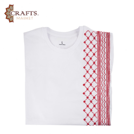 A cotton and polyester T-shirt, size (L), hand-embroidered with the Jordanian shemagh A cotton and polyester T-shirt, size (L), hand-embroidered with the Jordanian shemagh