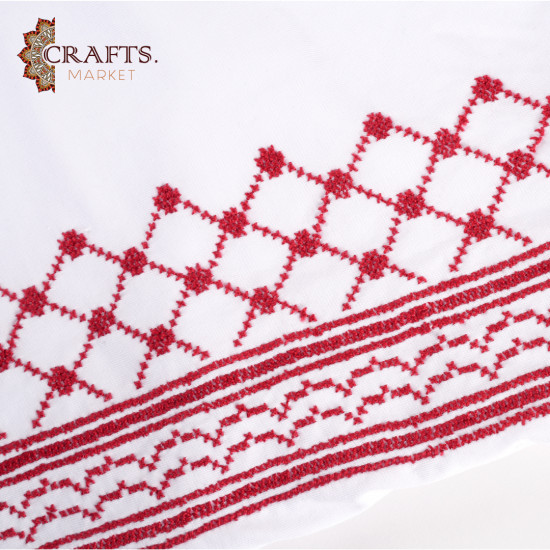 A cotton and polyester T-shirt, size (L), hand-embroidered with the Jordanian shemagh A cotton and polyester T-shirt, size (L), hand-embroidered with the Jordanian shemagh