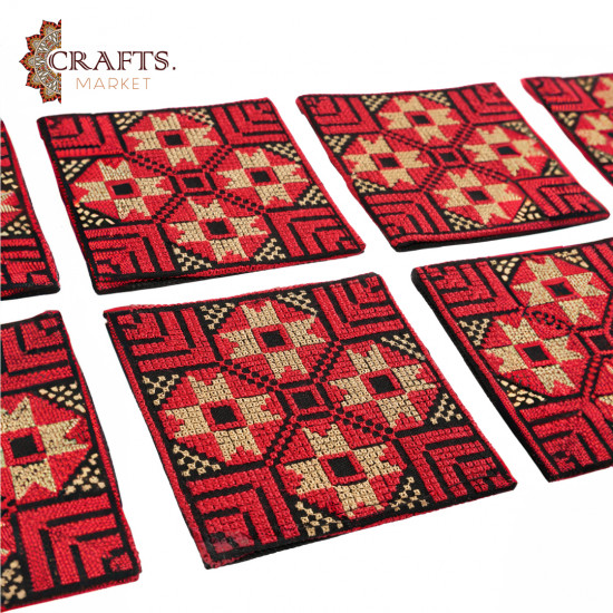 A handmade set of 6 embroidered fabric coasters A handmade set of 6 embroidered fabric coasters