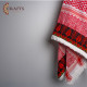 A red shemagh with red and green hand embroidery A red shemagh with red and green hand embroidery