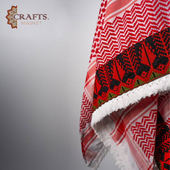 A red shemagh with red and green hand embroidery A red shemagh with red and green hand embroidery