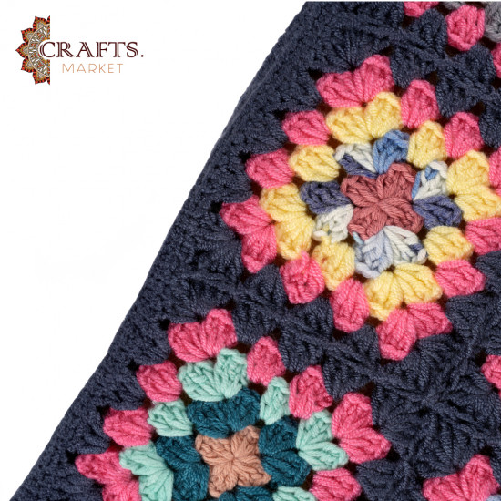 A handmade crochet clutch bag