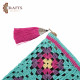 A handmade crochet clutch bag