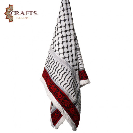 A hand-embroidered keffiyeh A hand-embroidered keffiyeh