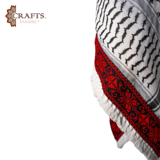 A hand-embroidered keffiyeh A hand-embroidered keffiyeh