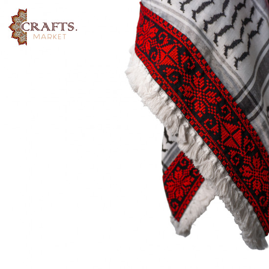 A hand-embroidered keffiyeh A hand-embroidered keffiyeh