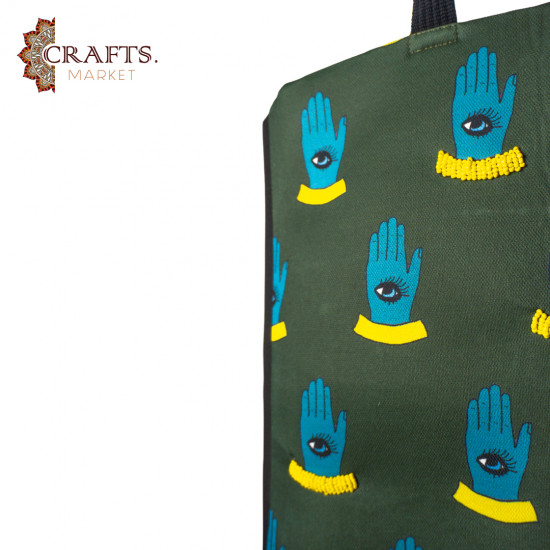 A handmade waterproof handbag with beadwork