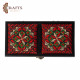 A handmade wooden gift box with a multicolored embroidered design A handmade wooden gift box with a multicolored embroidered design