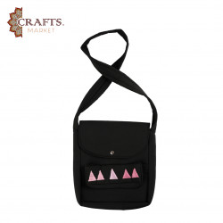A handmade shoulder bag with beautiful pyramid embroidery