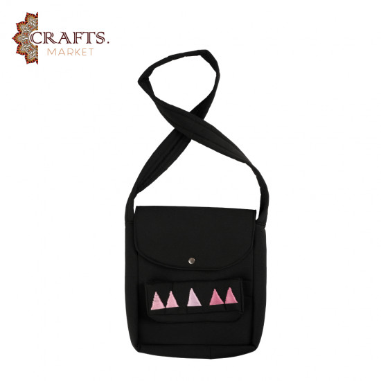 A handmade shoulder bag with beautiful pyramid embroidery