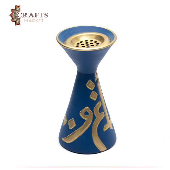 A blue pottery incense burner decorated with Arabic letters