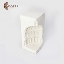A cement candle holder in the shape of the ancient Pantheon - white