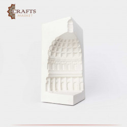A cement candle holder in the shape of the ancient Pantheon - white