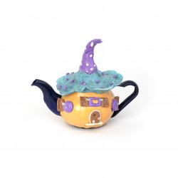 House shaped teapot table decor with purple hat