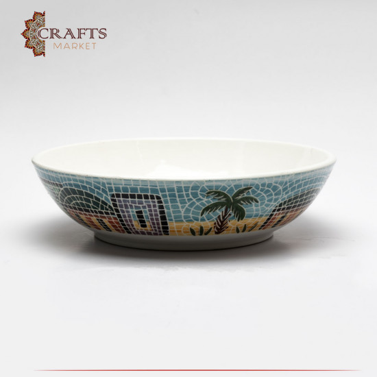 It is a round plate with white and turquoise colours