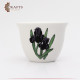 Plain coffee cup with black iris flower
