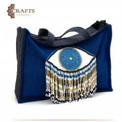 حقيبة من الكتان مصنوعة يدوياً لون كحلي بتصميم عين باللون الأزرق والأبيض