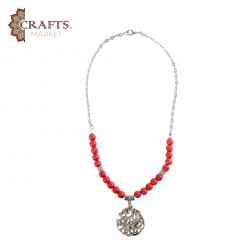 Red beaded necklace featuring a Quranic verse pattern Red beaded necklace featuring a Quranic verse pattern