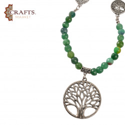 Necklace made of natural green jade stone with a Tree of Life design Necklace made of natural green jade stone with a Tree of Life design