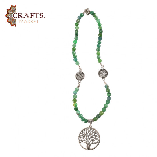 Necklace made of natural green jade stone with a Tree of Life design Necklace made of natural green jade stone with a Tree of Life design