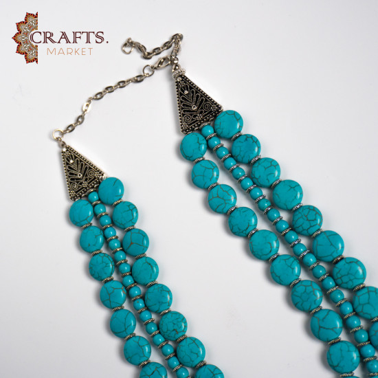 Turquoise beaded necklace with a geometric net pattern