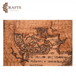 A hand-painted wall hanging featuring a compass design A hand-painted wall hanging featuring a compass design