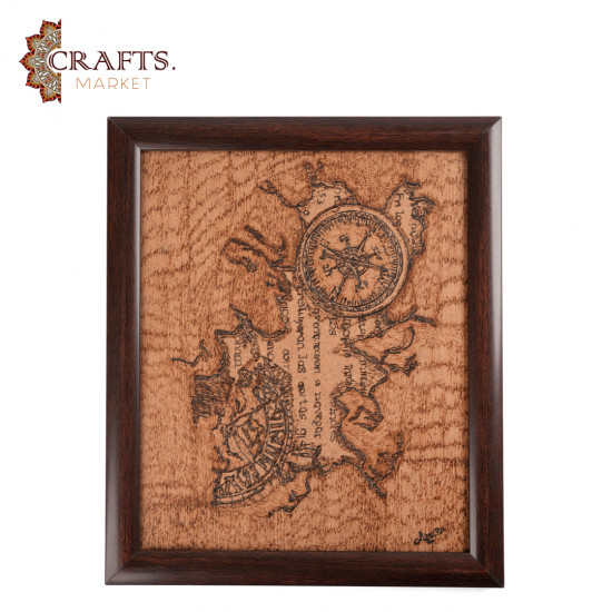 A hand-painted wall hanging featuring a compass design