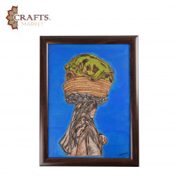 A hand-painted wall hanging featuring an elderly Palestinian woman A hand-painted wall hanging featuring an elderly Palestinian woman