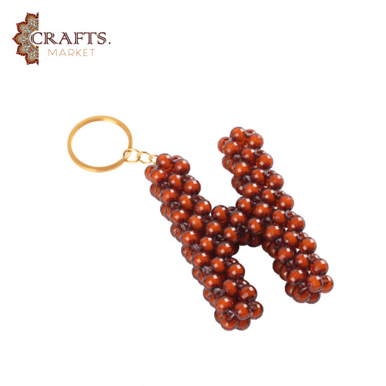 Handmade beaded keychain with a 3D letter (H) Handmade beaded keychain with a 3D letter (H)