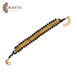 A handmade bracelet made of metal and beads,Gold and Black