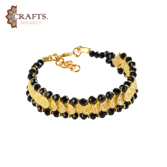 A handmade bracelet made of metal and beads,Gold and Black